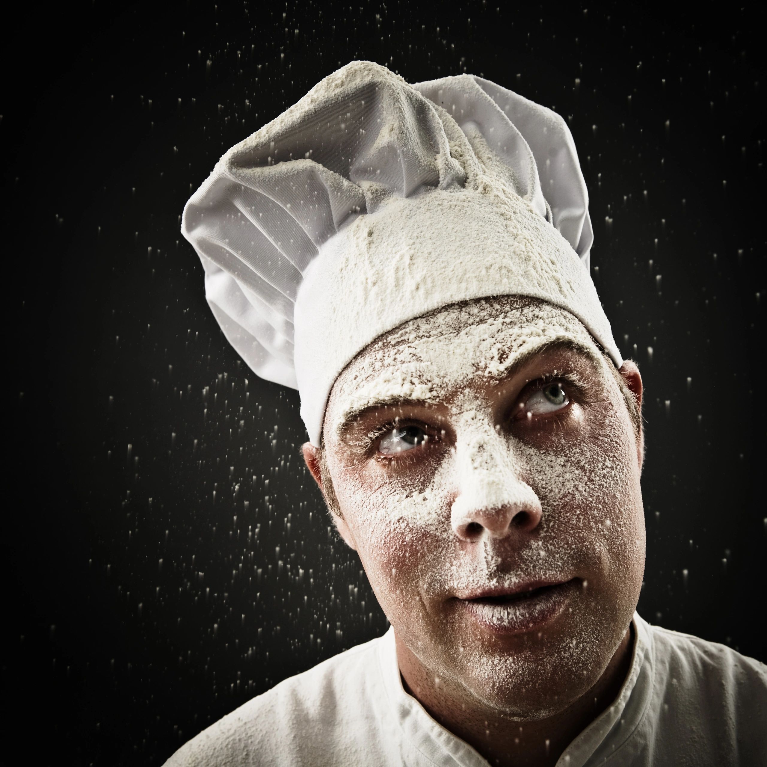Portrait of a baker dusted with flour