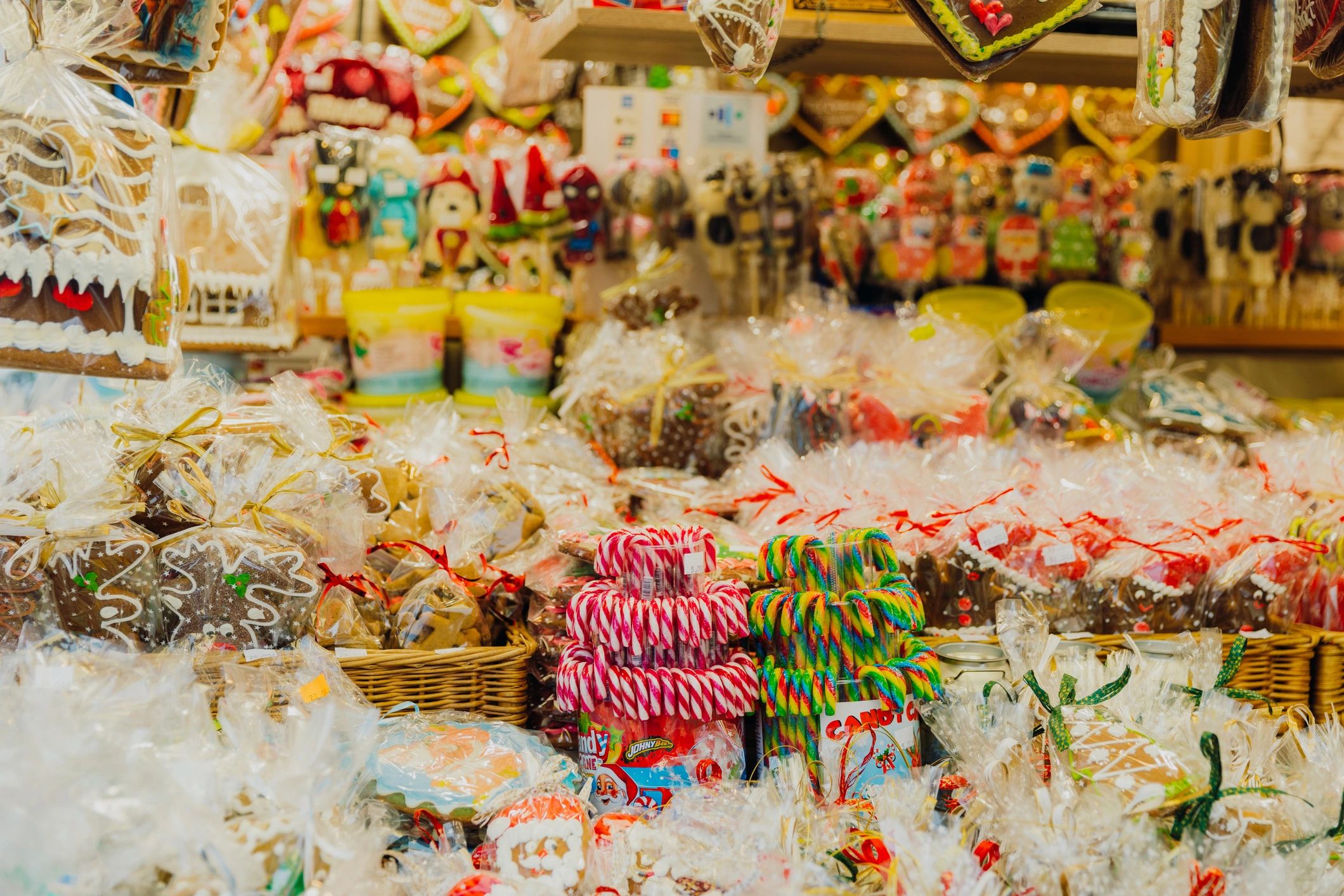 Customer browsing colorful sweets at a market