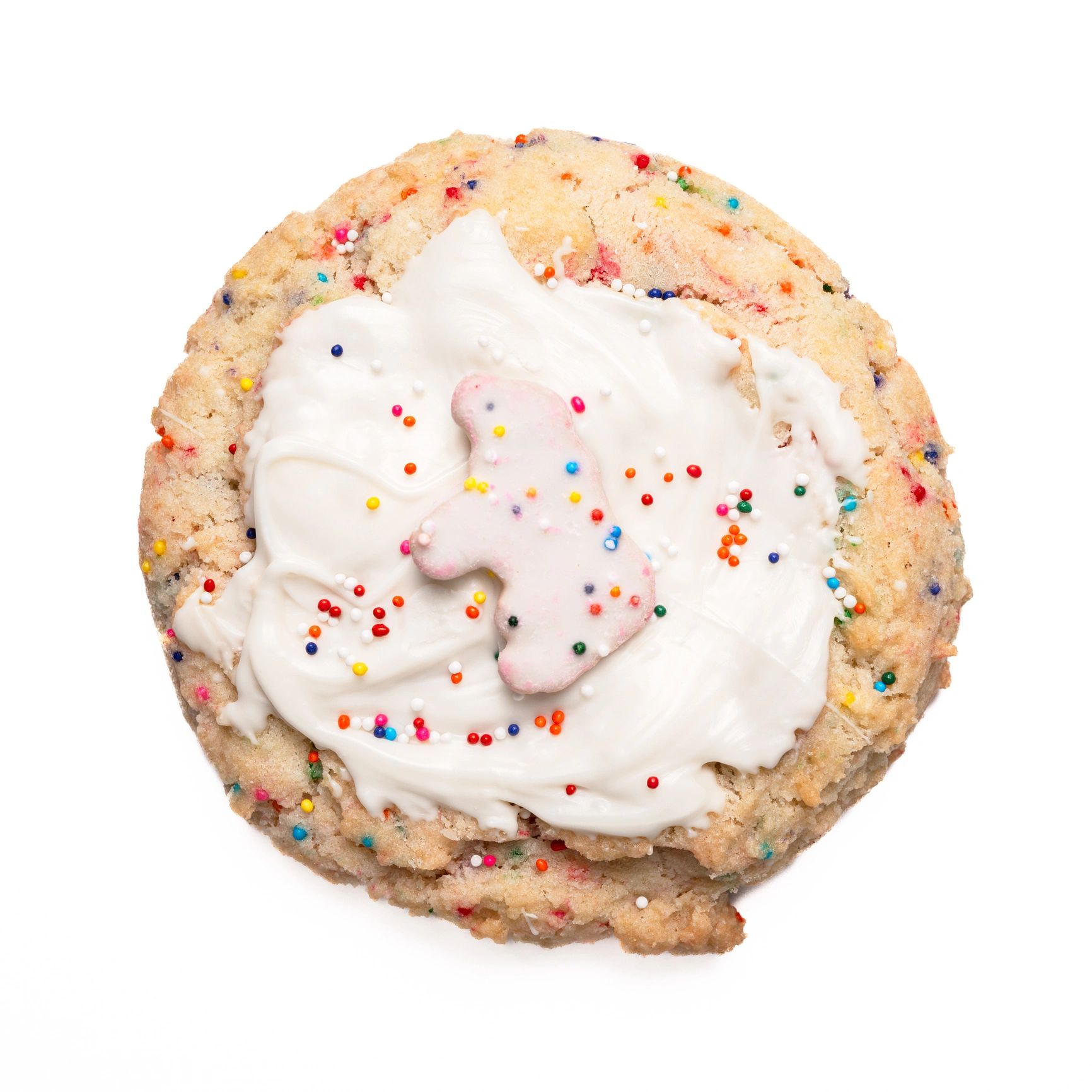 Unicorn-themed birthday cake with colorful frosting and sprinkles