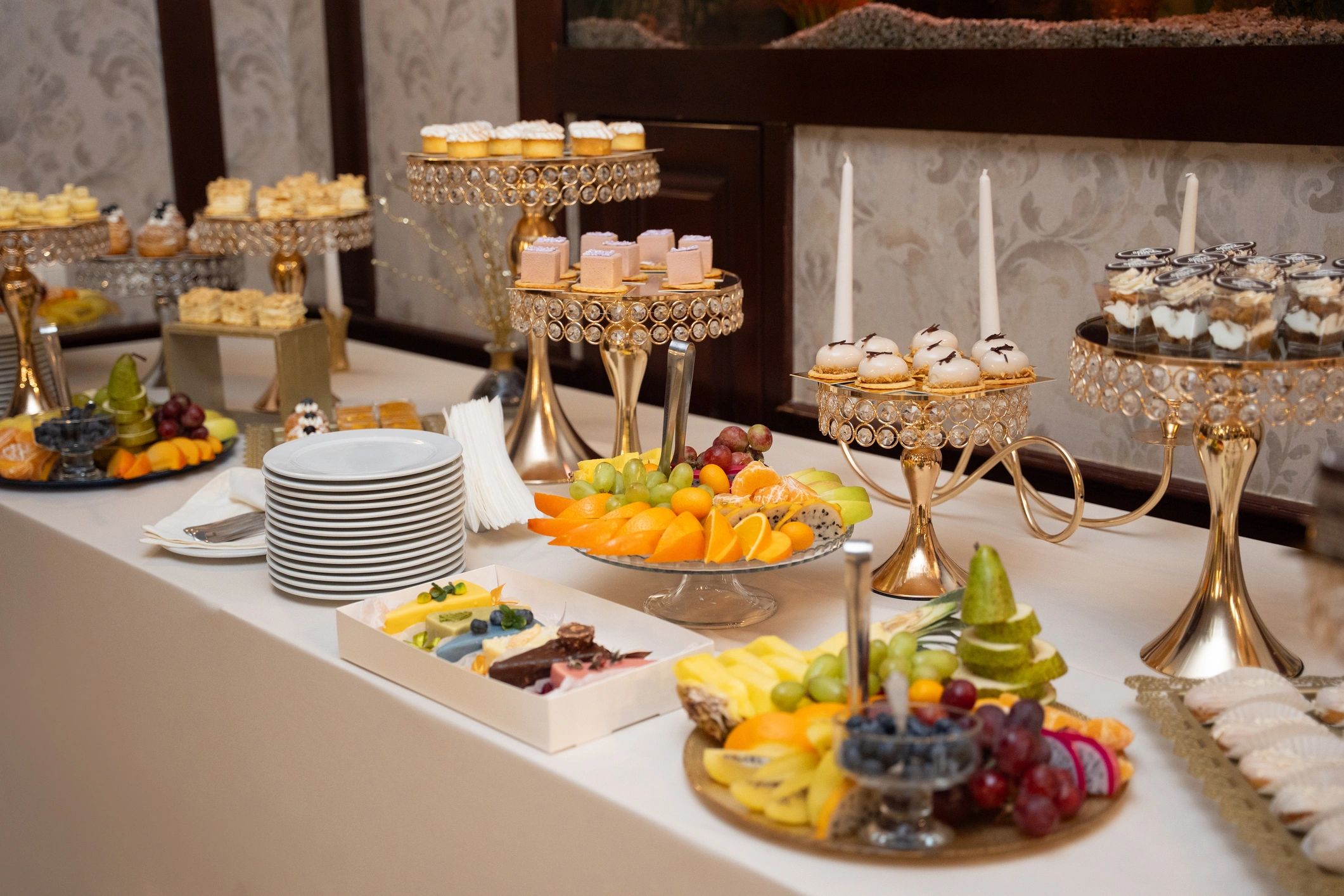 Dessert table with pastries and mini cakes