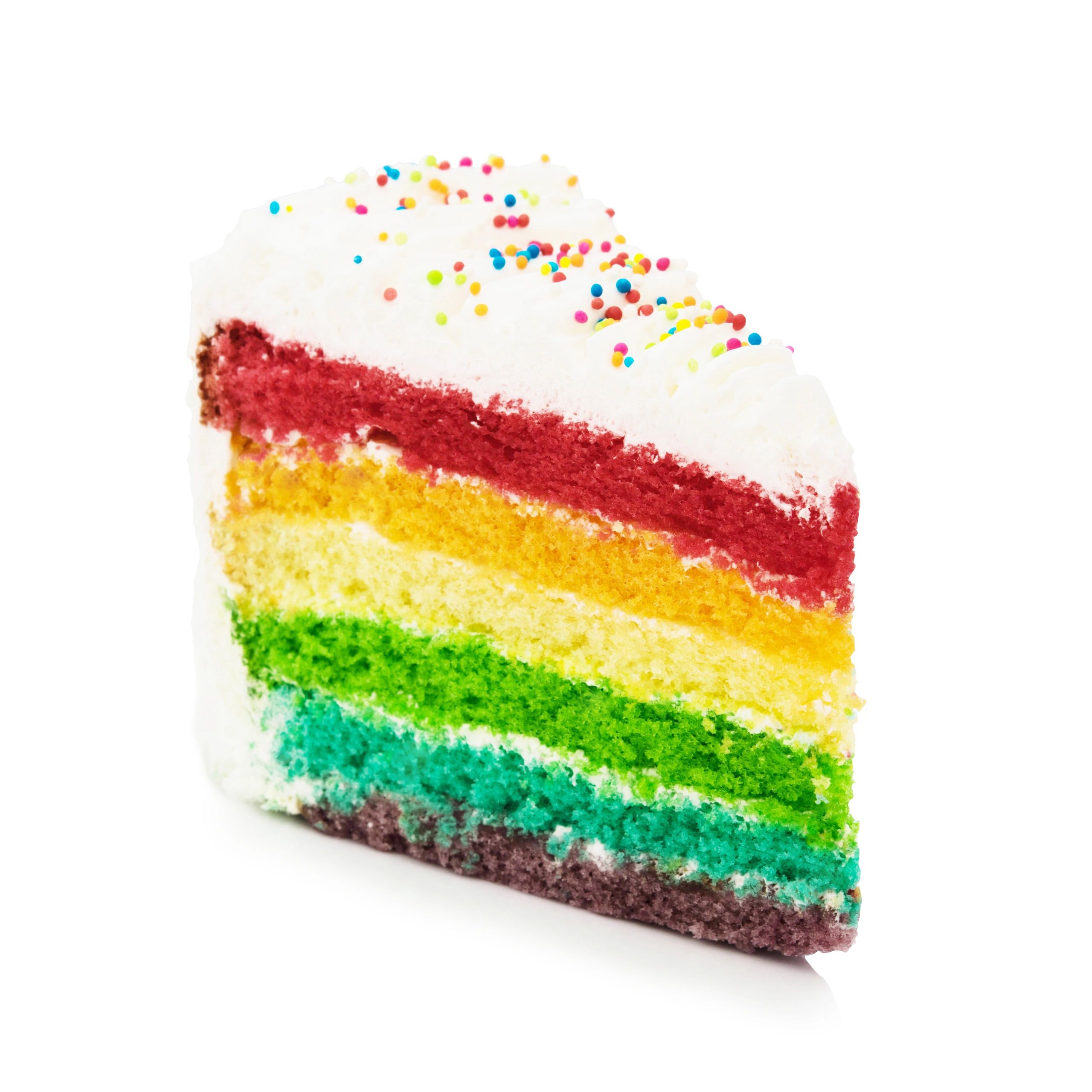 Colourful rainbow cake slice on a white background